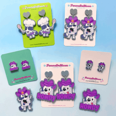 Disney character earrings with purple hair and fun, whimsical styles.