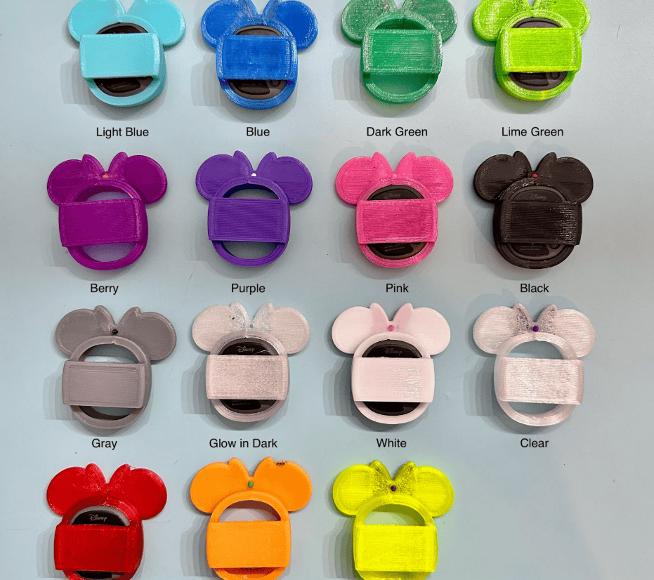 Colorful Mickey Mouse-shaped clips in blue, green, pink, purple, and more.