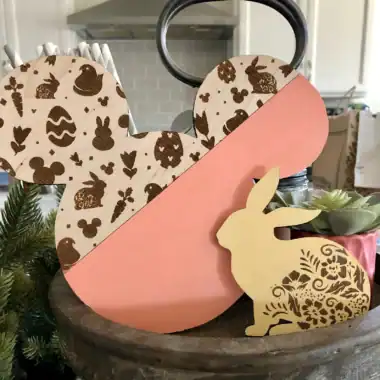 Easter bunny wooden decor with patterned and painted elements, perfect for spring holiday decoration.