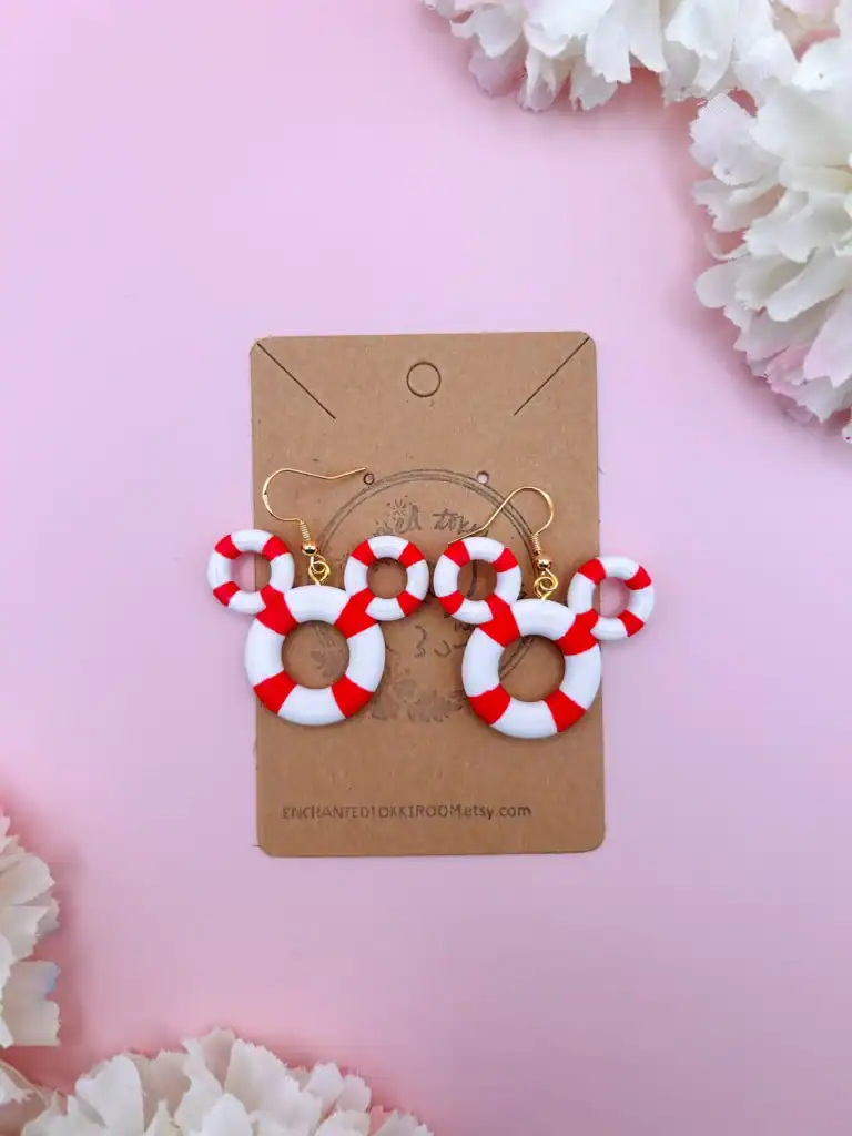 Themed jewelry with red and white lifebuoy design.