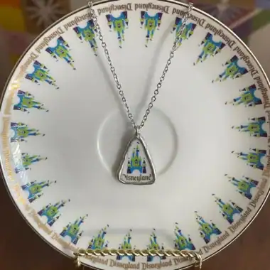 Vintage Disneyland Sleeping Beauty Castle necklace from the 1970s.