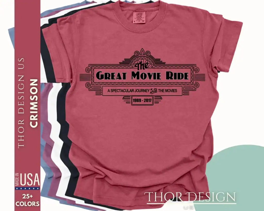 Pink Disney T-shirt featuring The Great Movie Ride logo and dates 1989-2017.