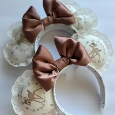 Reindeer-themed headbands with lace and satin bows, perfect for Disney-inspired holiday costumes.