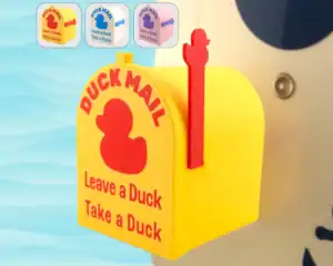 Colorful duck mailbox toy for children with phrases "Leave a Duck, Take a Duck.".