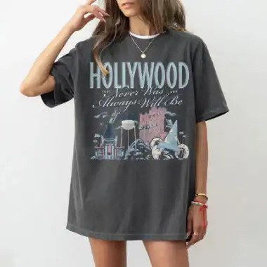 Vintage Hollywood graphic T-shirt with Disney-inspired design and text.