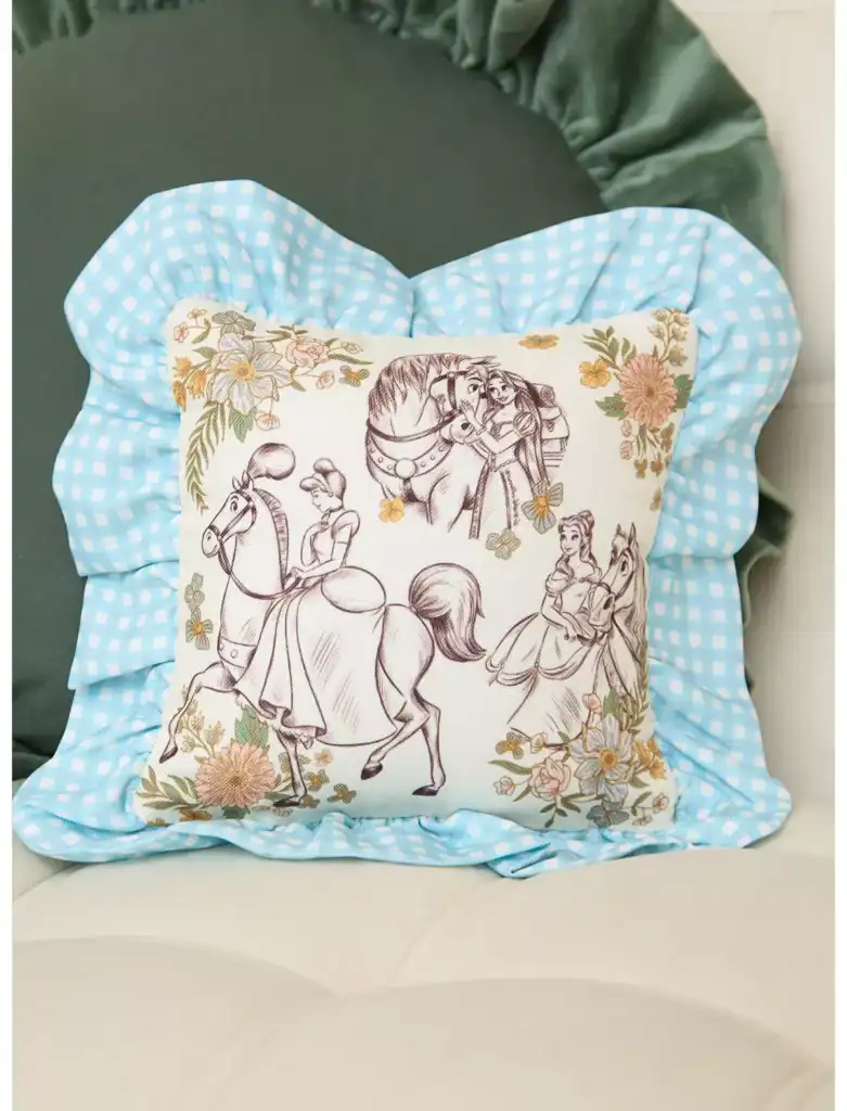 Elegant embroidered pillow featuring Disney princesses and horses.