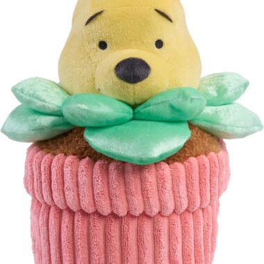 Adorable Winnie the Pooh plush plant in a pink knitted pot with green leaves. Perfect Disney collect.