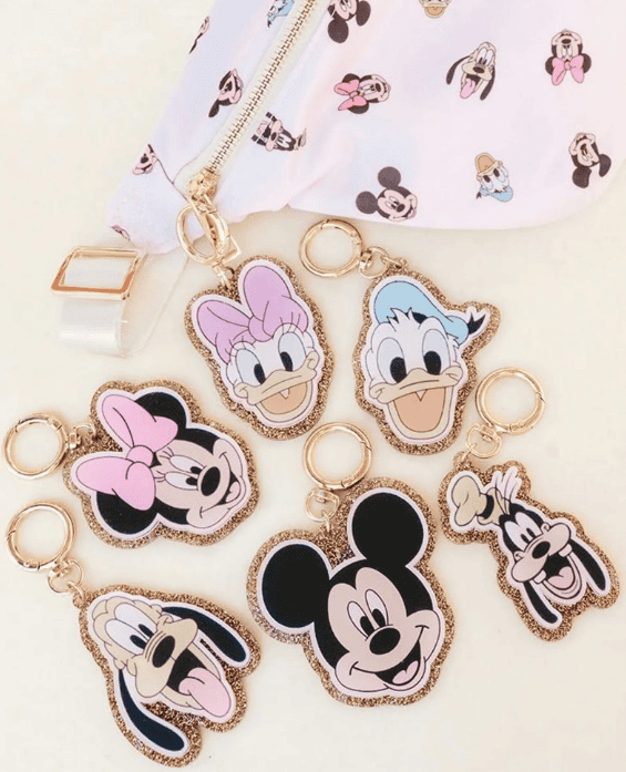 Colorful Disney Mickey and Friends keychains with Minnie, Mickey, and friends designs.