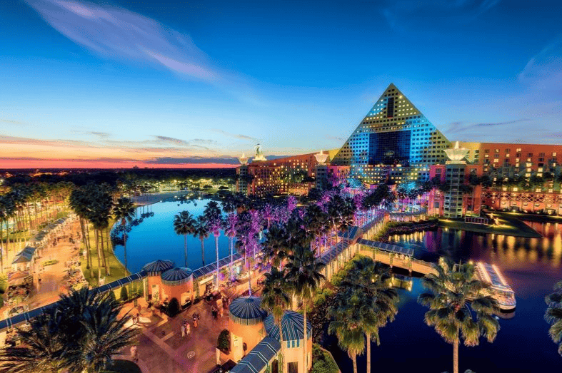 Beautiful view of Swan and Dolphin hotel during sunset with vibrant sky and illuminated pools.