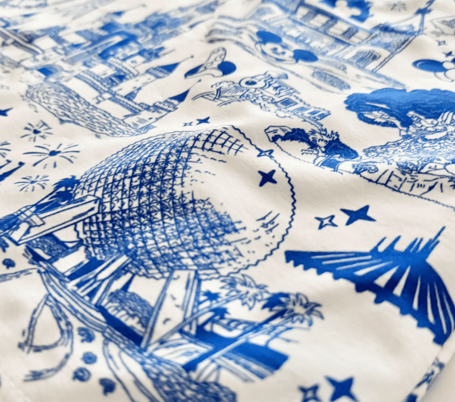 Blue Disney-inspired fabric featuring iconic characters and scenes, perfect for crafting and fashion.