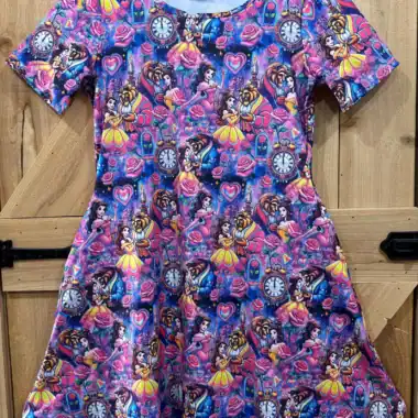 Disney princess dress with vibrant heart and clock pattern, perfect for fans of Disney fashion and p.