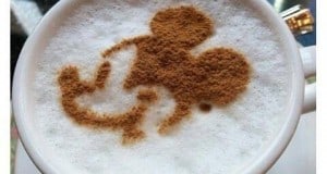 Cappuccino topped with a cocoa Mickey Mouse design on the foam—an Instagram-perfect treat for Disney World fans.