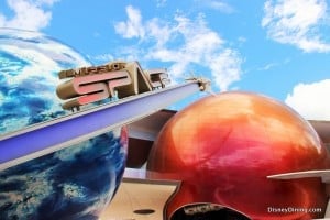 Mission: SPACE’s entrance at Epcot wows with massive planet models and a bright sky, drawing thrill-seekers to Walt Disney World.