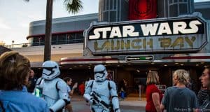 Fans and stormtroopers gather outside Star Wars Launch Bay at Hollywood Studios, a top experience for Disney park enthusiasts.