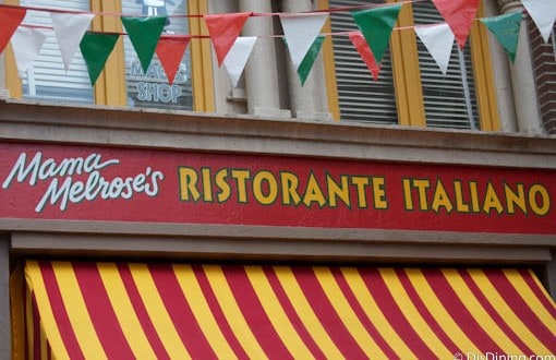 Mama Melrose’s Ristorante Italiano sign with festive bunting beckons guests to this classic Disney’s Hollywood Studios eatery.