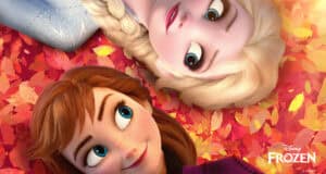 Anna and Elsa from Disney’s Frozen lie on colorful autumn leaves, facing each other with warm, happy expressions. Discover fun Disney facts as the Frozen logo sits in the bottom right corner.