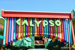 CALYPSO towers over Disney’s Value Resort entrance, with bold letters and vibrant hanging tubes welcoming guests.