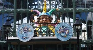 Disney’s Port Orleans French Quarter entrance with its bold jester head and lively Mardi Gras décor welcomes guests to the magic.