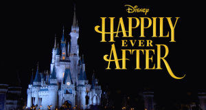 Cinderella Castle glowing at night during Happily Ever After, yellow title text shining as music enchants Magic Kingdom guests.