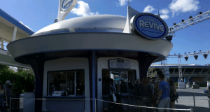 Joffrey’s Revive coffee kiosk in Tomorrowland draws a crowd under bright skies at Walt Disney World.