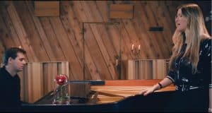 Nicholas Wells accompanies Nafsica’s enchanting performance of "Beauty and the Beast" on piano in a themed, cozy setting.