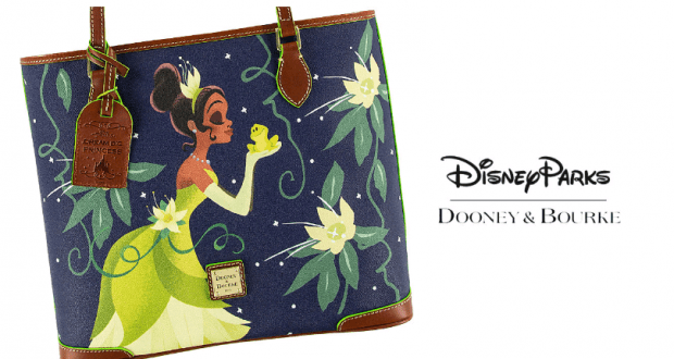 Disney Parks Dooney & Bourke navy tote with Princess Tiana, frog, florals, brown leather trim—an exclusive park style essential.
