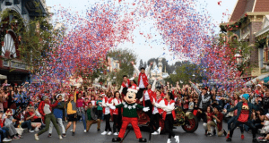 Mickey Mouse and the cast light up Disneyland’s Christmas Celebration as red, white, and blue confetti bursts overhead on ABC.