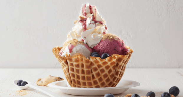 Indulge in Vivoli il Gelato’s April Sundae Special: waffle bowl, creamy scoops, whipped cream, blueberries, cookie crumbles—exclusive to Walt Disney World.