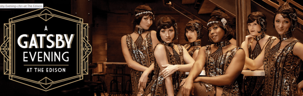 Guests dressed as 1920s flappers pose by "A Gatsby Evening at The Edison" sign, celebrating Disney Springs’ vintage nightlife flair.