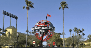 ESPN Wide World of Sports globe with red flag and palm trees, iconic Disney World spot where American Idol held auditions.