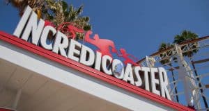 Incredicoaster ride sign at Disneyland with The Incredibles silhouettes and palm trees—an essential thrill for Disney fans.