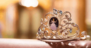 A sparkling tiara featuring a Disney Princess portrait, glimmering against a dreamy backdrop—magical for Disney fans.