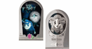 Haunted Mansion blue ghost plush trio in a tomb-shaped box next to a gray ghost portrait—Disney World Halloween exclusive!.