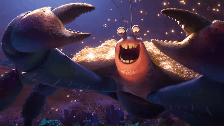 An oversized sparkling crab character grins and raises its claws beneath festival lights, capturing classic Disney magic.