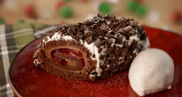Indulge in a chocolate and cream Swiss roll with cherries, chocolate curls, and vanilla ice cream—only at Walt Disney World!.
