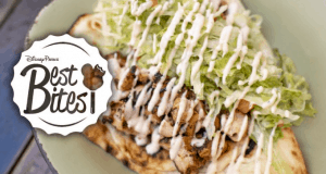 Disney Parks Best Bites: Grilled chicken flatbread topped with lettuce and sauce, spotlighted as a top pick at Walt Disney World.