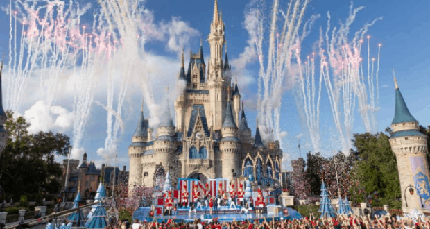 Dazzling fireworks light up Cinderella Castle as Disney fans celebrate during the magical Disney Parks Christmas Day Parade.