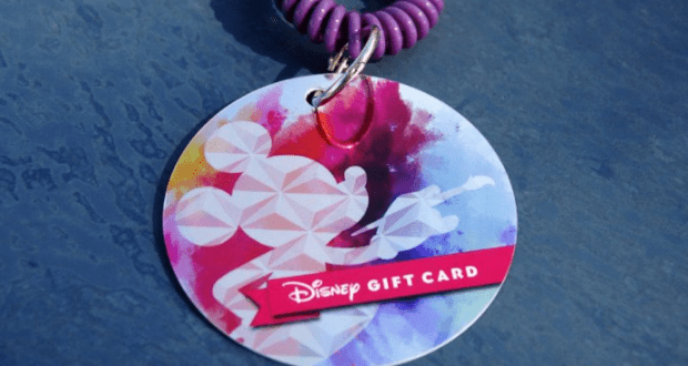 Colorful Mickey Mouse Disney Gift Card on a purple coil wristband, perfect for Epcot International Festival of the Arts at Disney World.