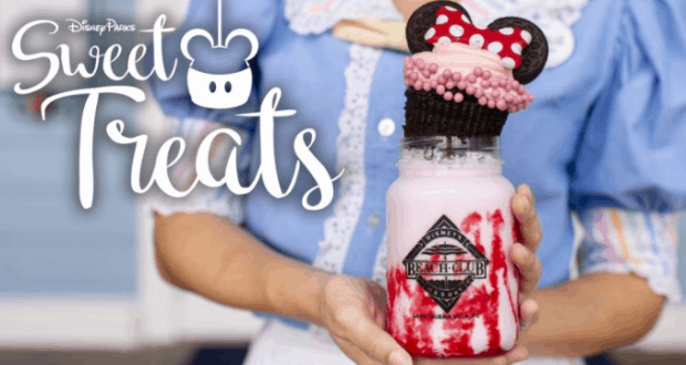 A mason jar milkshake topped with cookies and candy, labeled "Sweet Treats," served at Walt Disney World in January 2019.