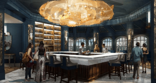 Beauty and the Beast-inspired bar with a grand chandelier, vibrant guests at a square counter, Grand Floridian-style navy décor.