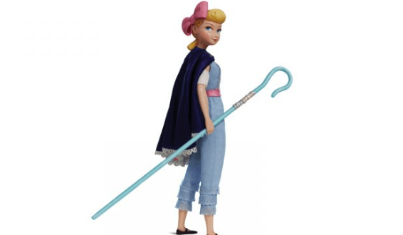 Bo Peep from Disney Parks in her signature blue outfit and cape, pink headband, and holding her blue shepherd's staff.