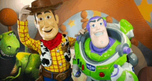 Woody and Buzz Lightyear greet fans with big smiles at Woody’s Roundup Barbecue Buffet in Disney World, ready for July 4th fun.