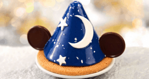 Sorcerer Mickey-inspired dessert with chocolate ears, stars, and moons on a cookie base for Hollywood Studios' 30th Anniversary.