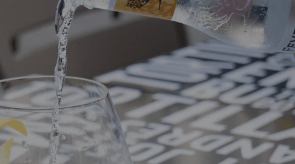 At Jaleo in Disney World, a crisp gin and tonic is poured over ice with a lemon twist, celebrating the Spring Gin & Tonic Fest.