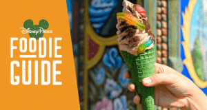 Indulge in a green waffle cone with chocolate ice cream and gummy worms, spotlighted in the Disney Parks Foodie Guide—an Animal Kingdom treat.