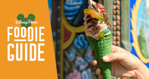 Indulge in a green waffle cone with chocolate ice cream and gummy worms, spotlighted in the Disney Parks Foodie Guide—an Animal Kingdom treat.