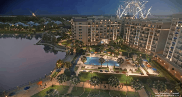 Spectacular fireworks burst over a Disney resort’s glowing pool and palm-lined lake—an epic New Year’s Eve for Disney fans.