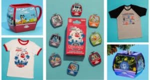 Disney Skyliner mugs, shirts, ornaments, and a collectible pin showcased on a blue surface for Walt Disney World fans.