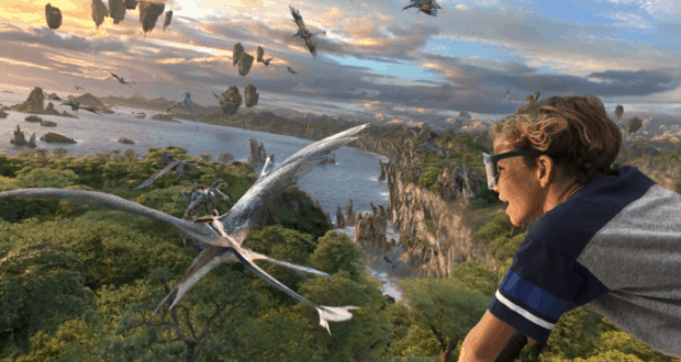 A child gazes in wonder at soaring banshees above Pandora’s floating mountains, capturing Disney’s fall magic at Animal Kingdom.