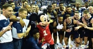 Mickey Mouse joins the Villanova basketball team for a cheerful group photo on court at Disney World’s 2019 Orlando Invitational.